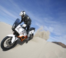 Jimmy Lewis rides down a dune on the KTM 990 Baja