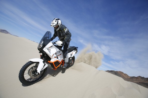 Jimmy Lewis rides down a dune on the KTM 990 Baja